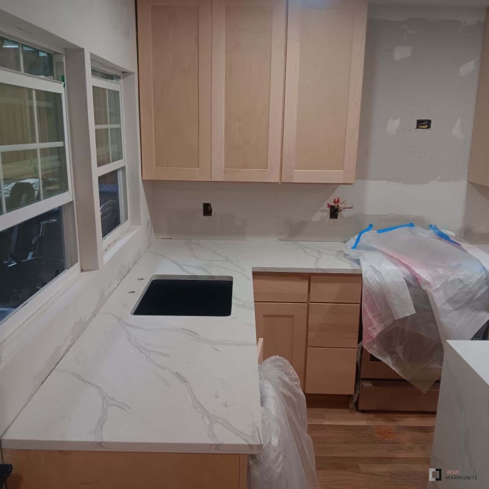 Custom kitchen cabinetry built and installed by Acue Marmonite