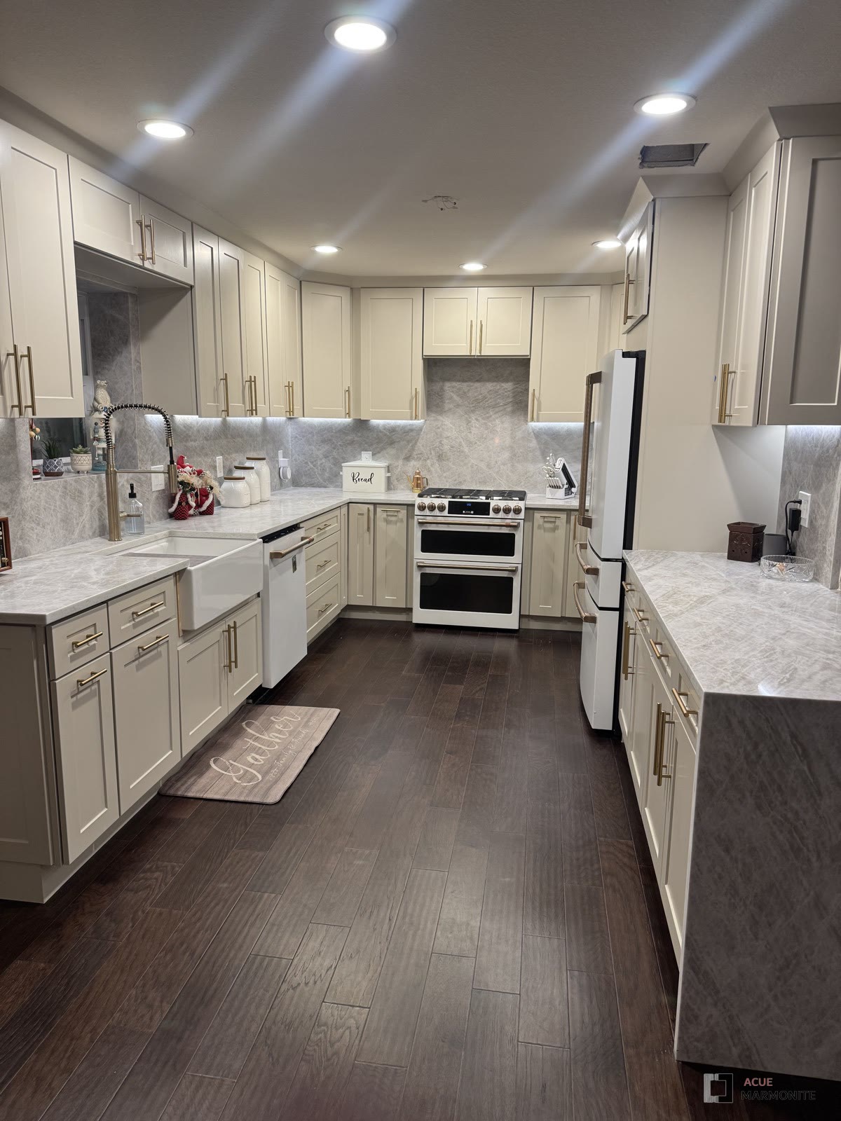 Premade cream shaker cabinetry, installed by Acue Marmonite