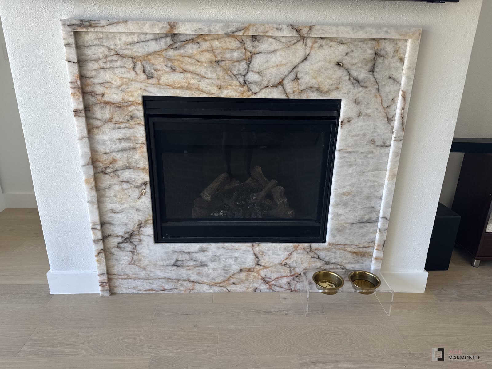 Crystallo fireplace surround with mantle, installed by Acue Marmonite