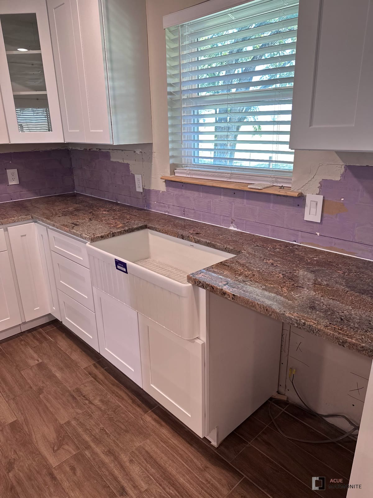 Creame Bordeaux granite kitchen countertop, installed by Acue Marmonite