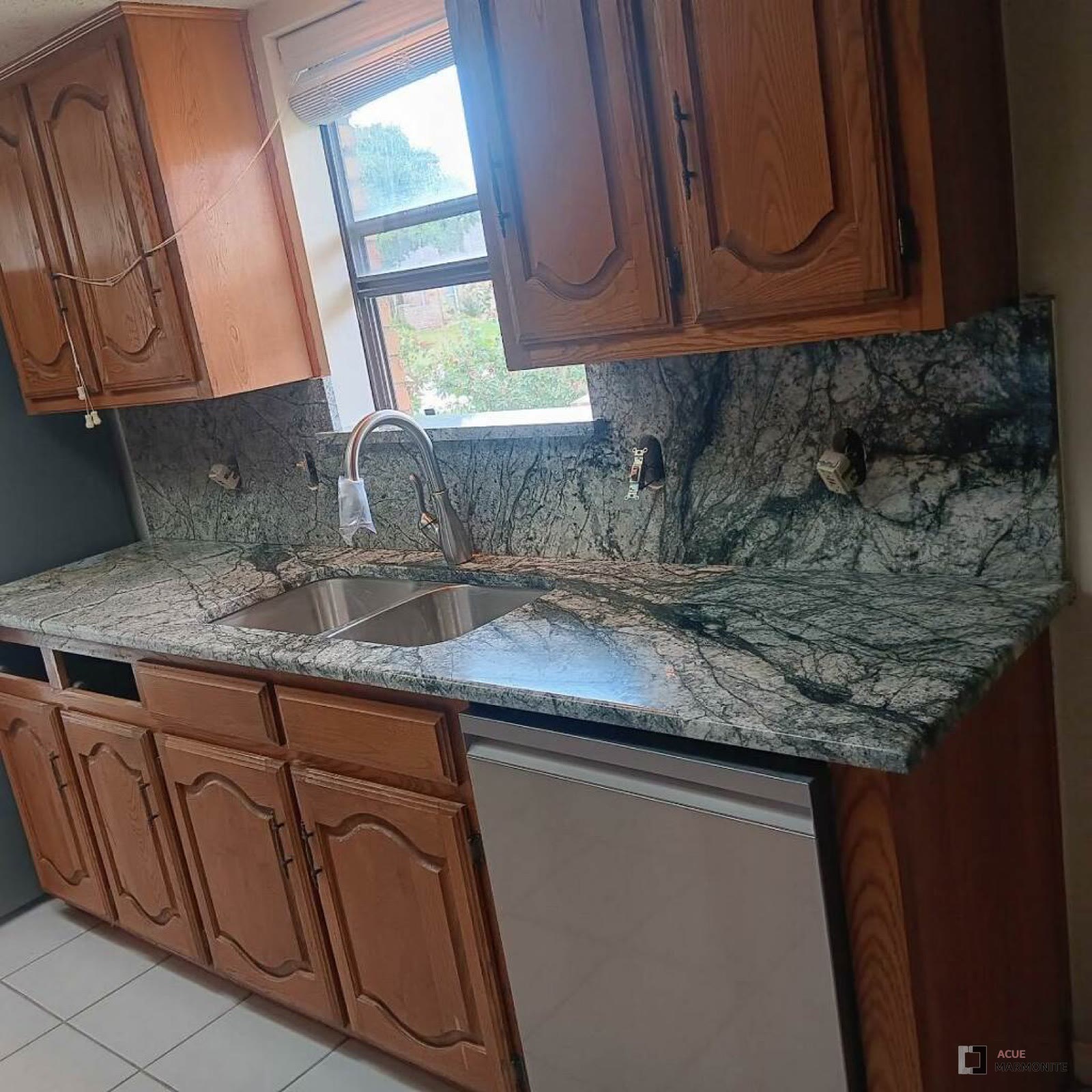 Jasper Blue granite countertop installed by Acue Marmonite
