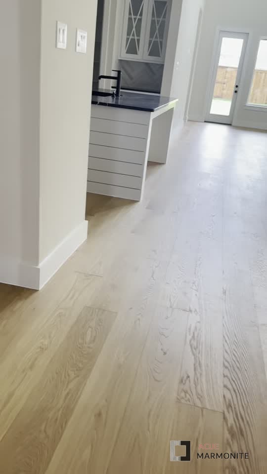 Engineered wood flooring installed by Acue Marmonite