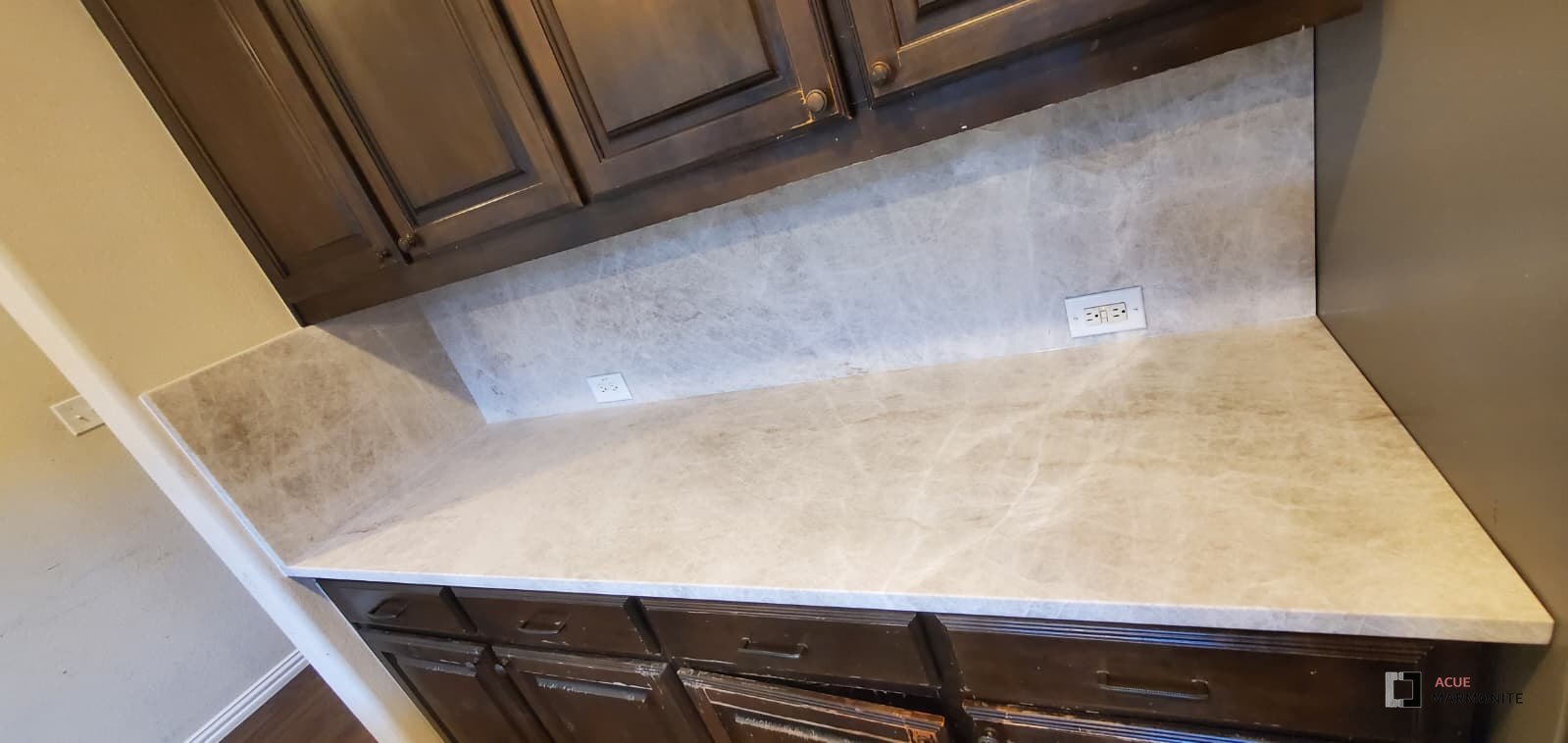 Taj Mahal quartzite, honed finish, coffee bar countertop with full-height backsplash in Carrollton, TX, installed by Acue Marmonite